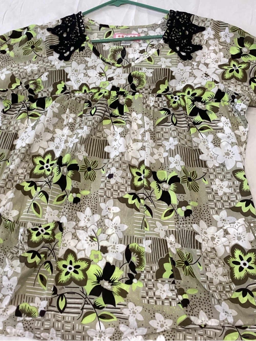 KOI V-Neck Scrub Top with Crochet Shoulders AND PLEATED BODICE. - Picture 8 of 11